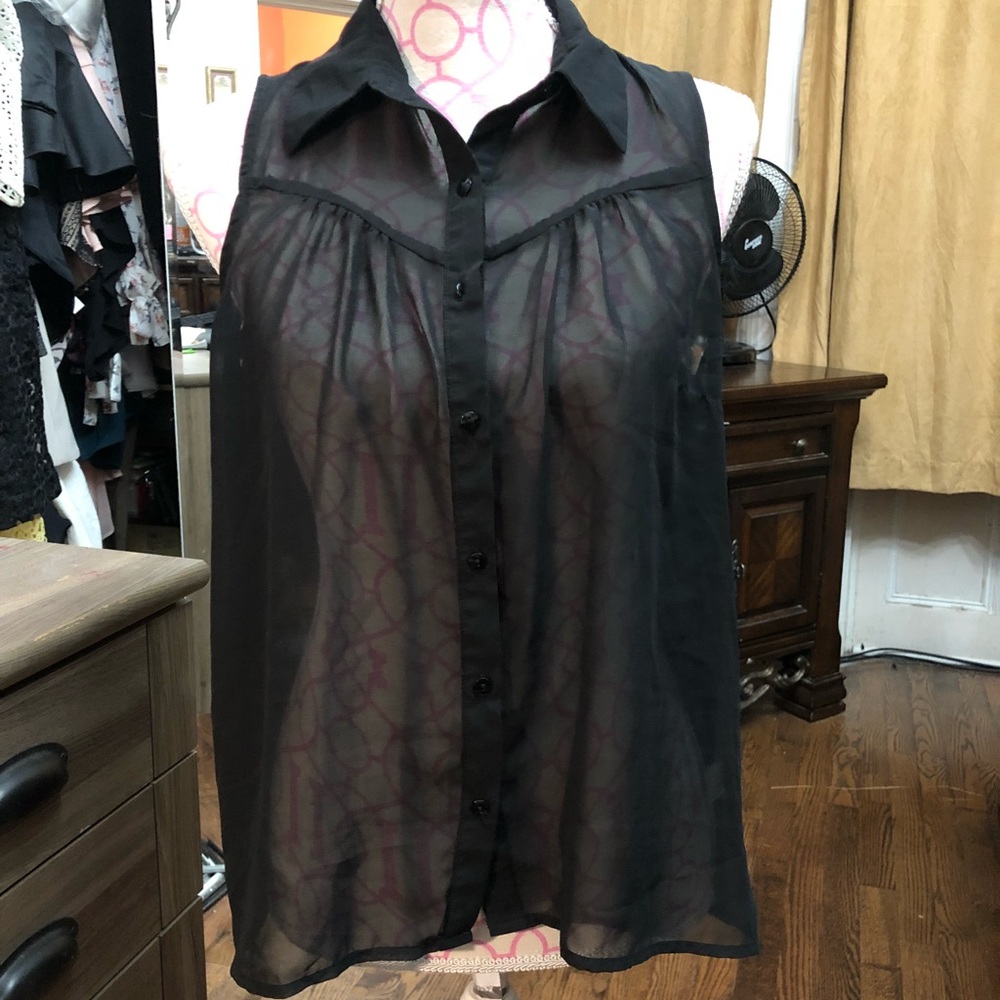 Black polyester button down see through shirt.